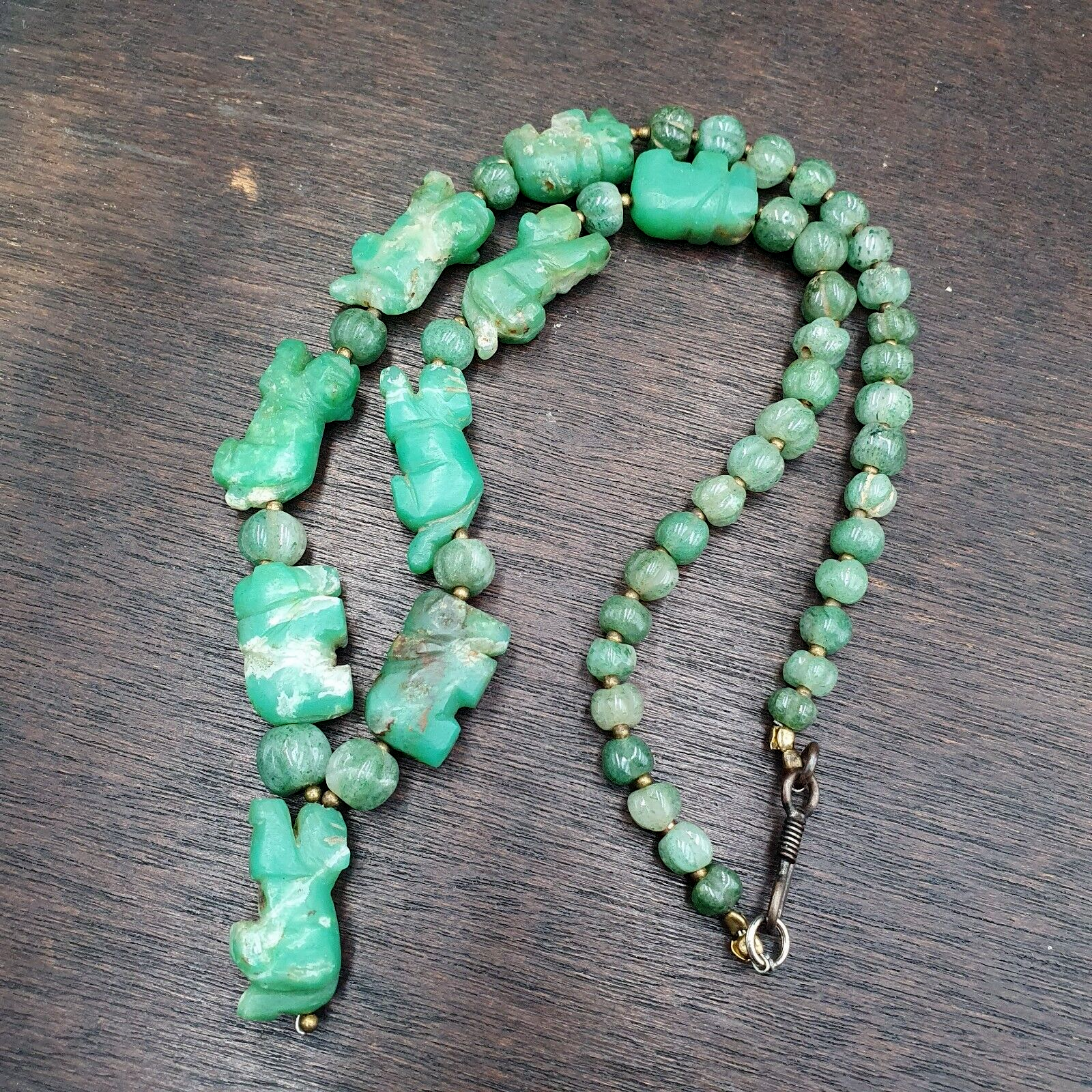 Vintage Chinese Tibetan Jade Carving Necklaces, boasting intricate jade animals delicately crafted in melon shapes. These captivating pieces fuse tradition with elegance, offering a timeless allure to your ensemble. Elevate your style with these rare treasures, each telling a story of ancient craftsmanship and cultural heritage.